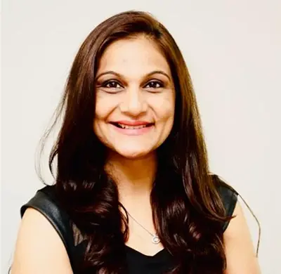 Photo of Radhika Patel, CFO and Product Manager at MicroWellness, focused on product development and financial growth.