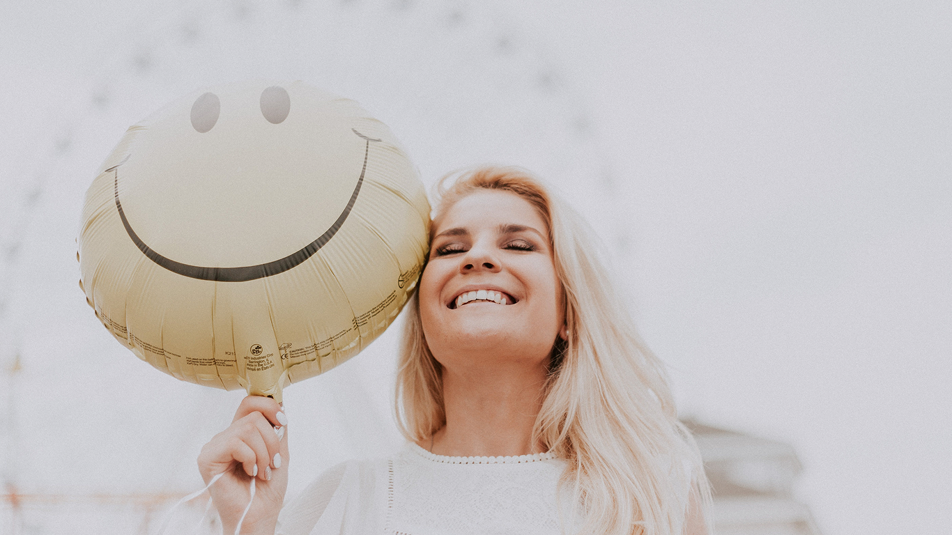 The Mental Health Benefits of Smiling